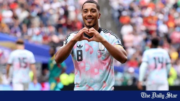 Player celebrating by making a heart gesture