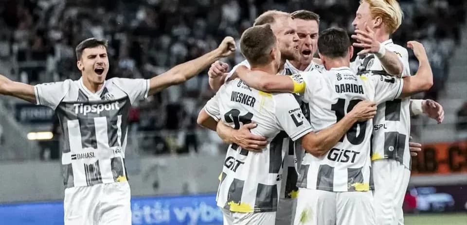 Players celebrating a goal during UEFA match
