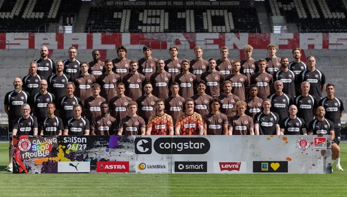 Team photo of St. Pauli players in stadium