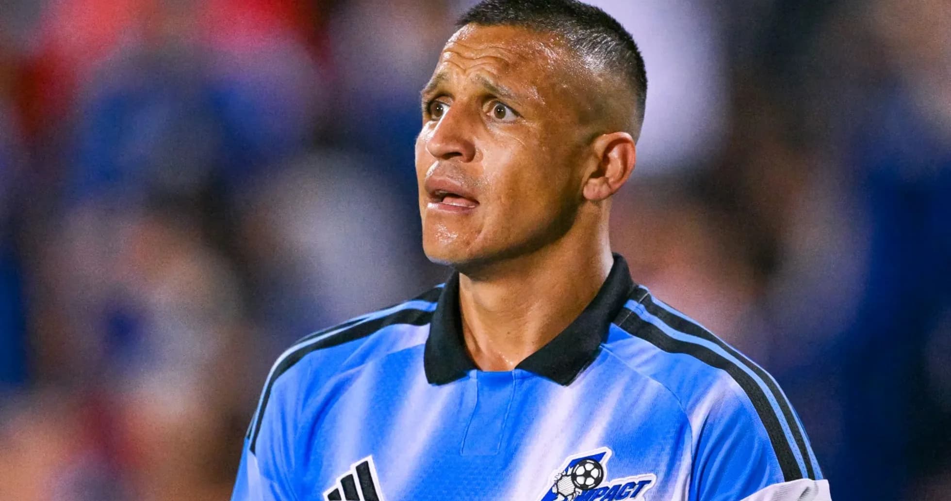 Referee in blue uniform during a match