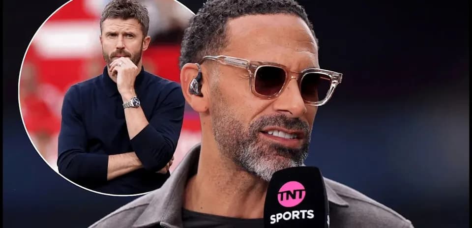 Rio Ferdinand speaking into microphone during broadcast