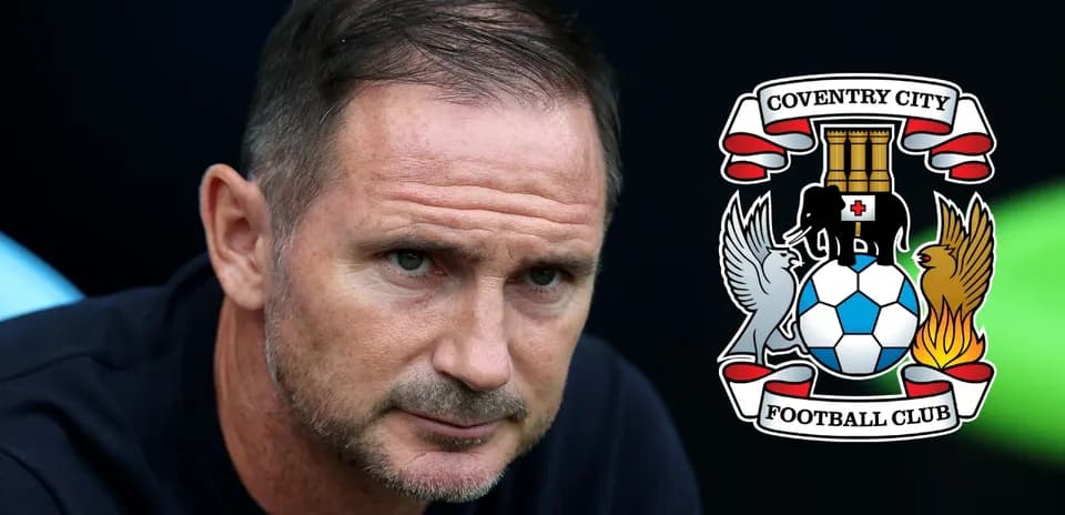 Close-up of manager with Coventry City logo