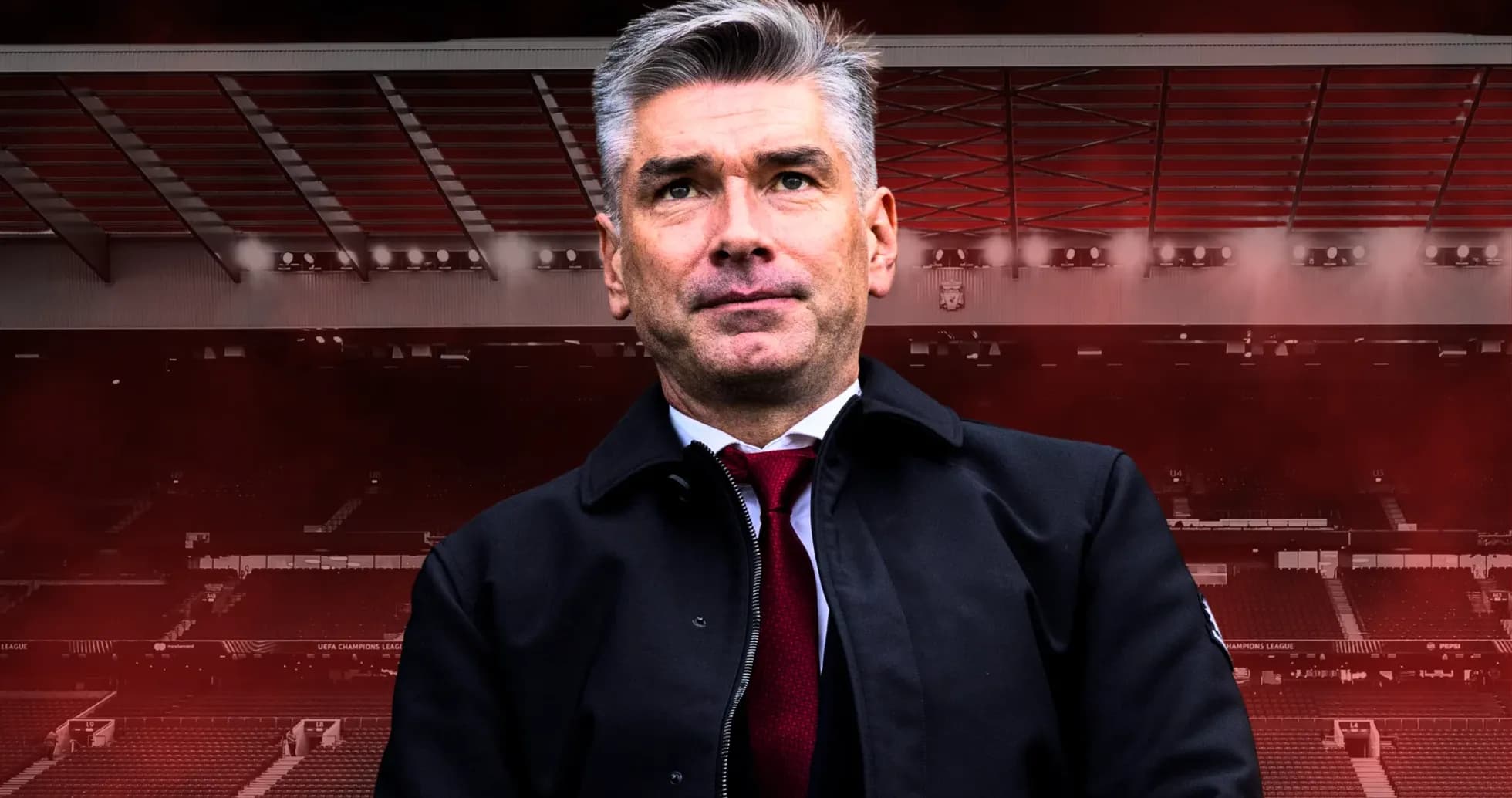 Manager standing in front of stadium background