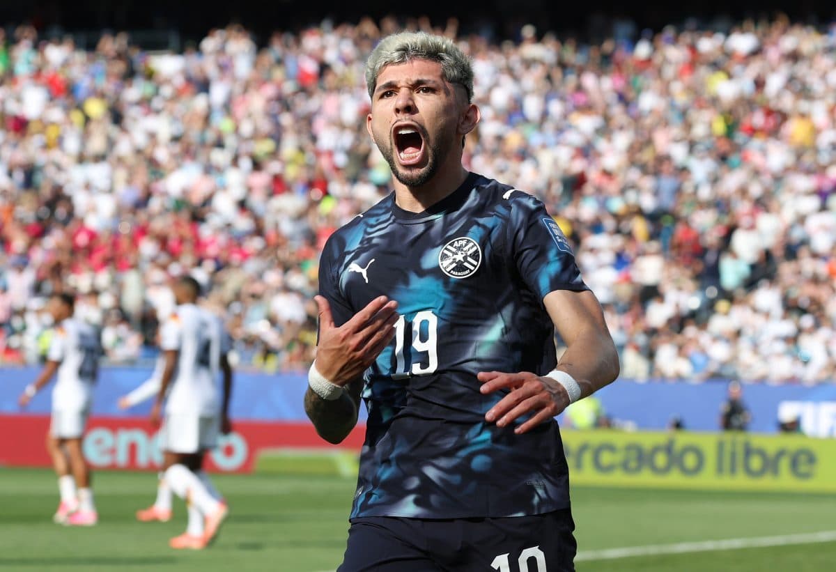 Player celebrating a goal during a match Player celebrating a goal during a match