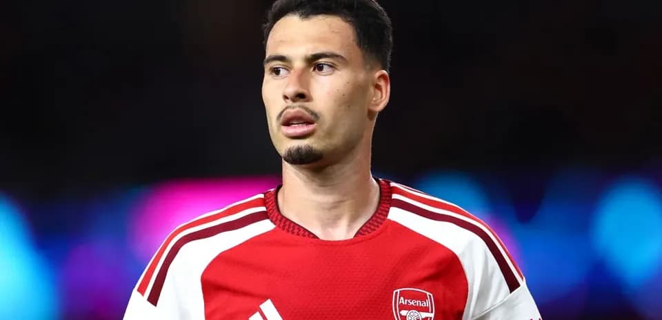 Arsenal player in red jersey during match
