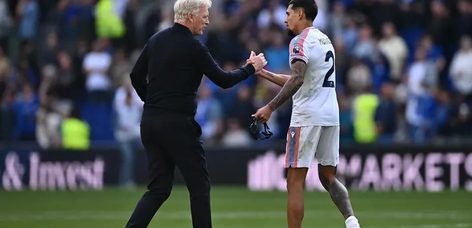 Coach and player shaking hands after the match