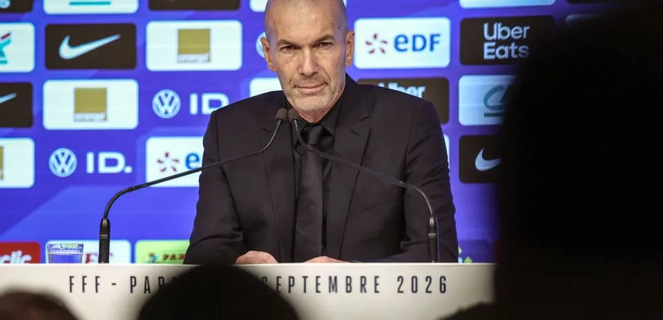Manager speaking at press conference podium