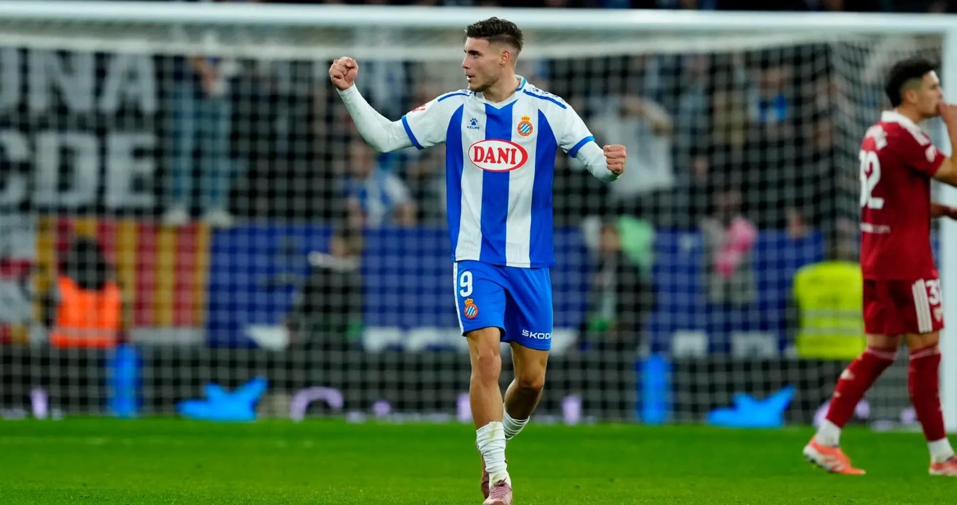 Espanyol player celebrating a goal during La Liga match