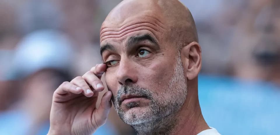 Coach wiping his eye during match