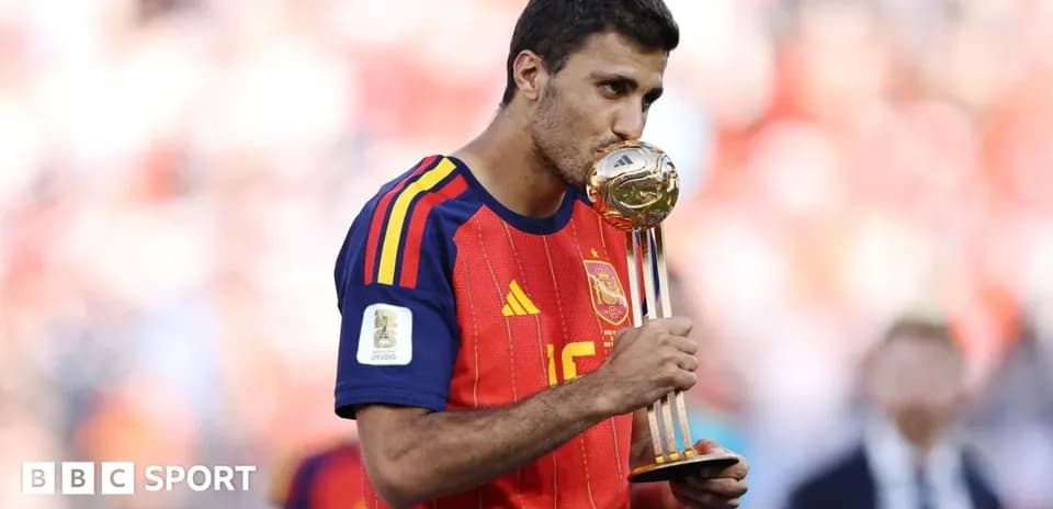 Player kissing the FIFA World Cup trophy