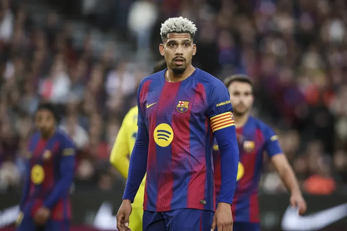 Barcelona player wearing captain's armband on field
