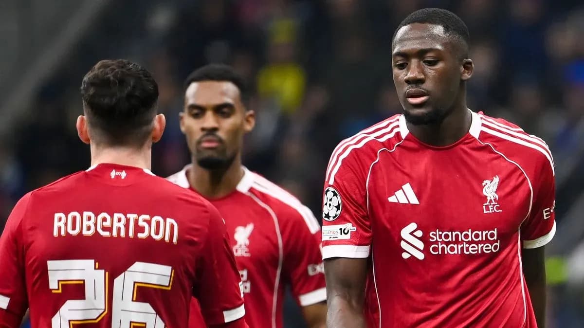 Liverpool players walking off the pitch during match