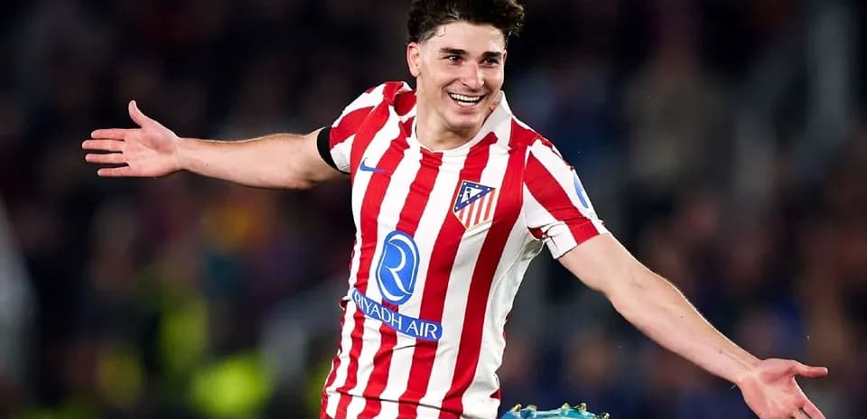 Atletico Madrid player celebrating a goal on field