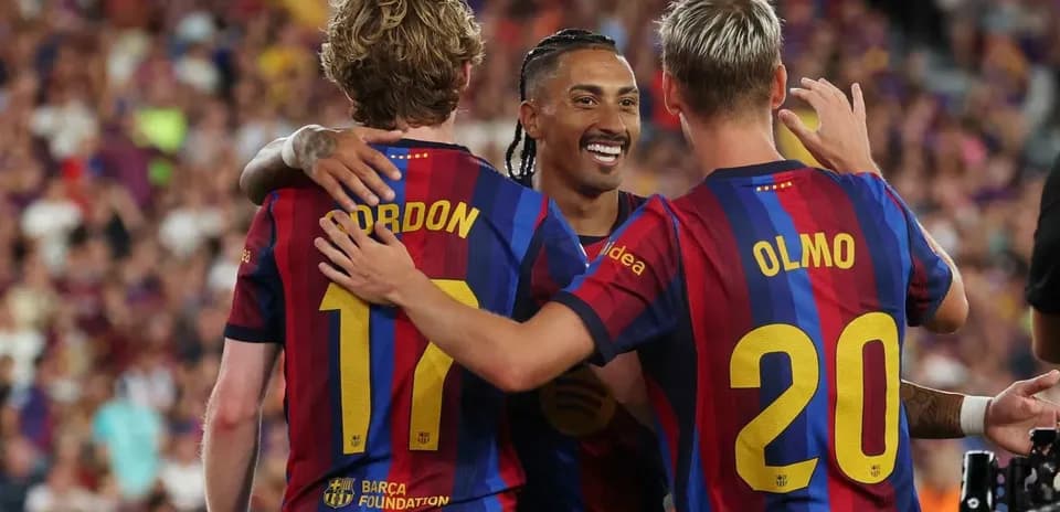 Players celebrating together after a goal