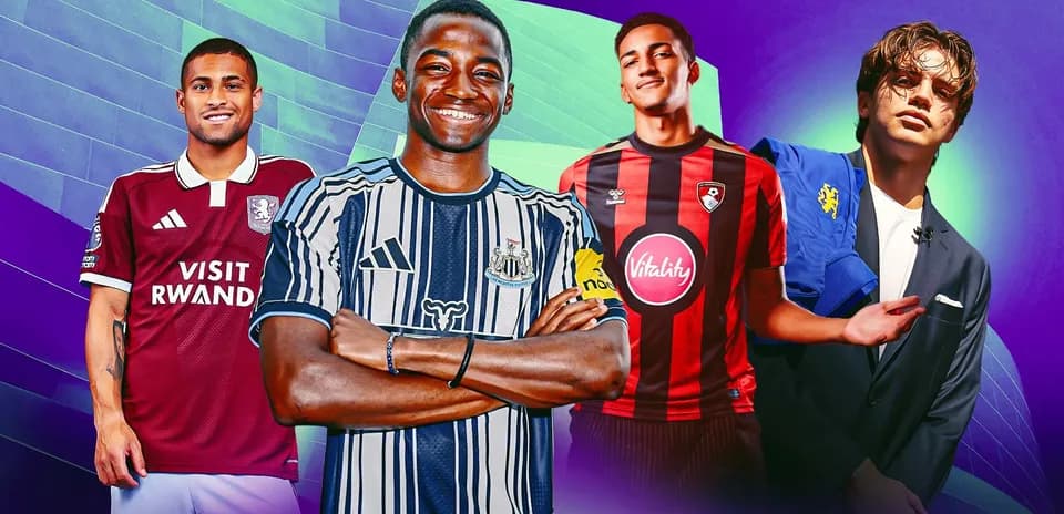 Four football players in club jerseys posing together