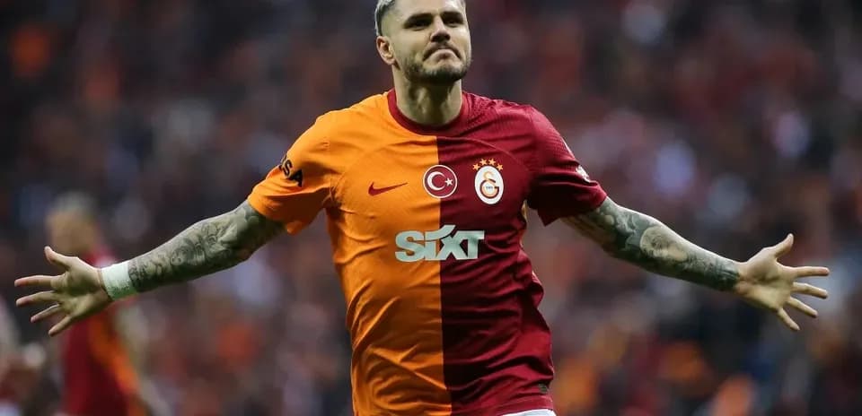 Player celebrating in Galatasaray jersey after scoring