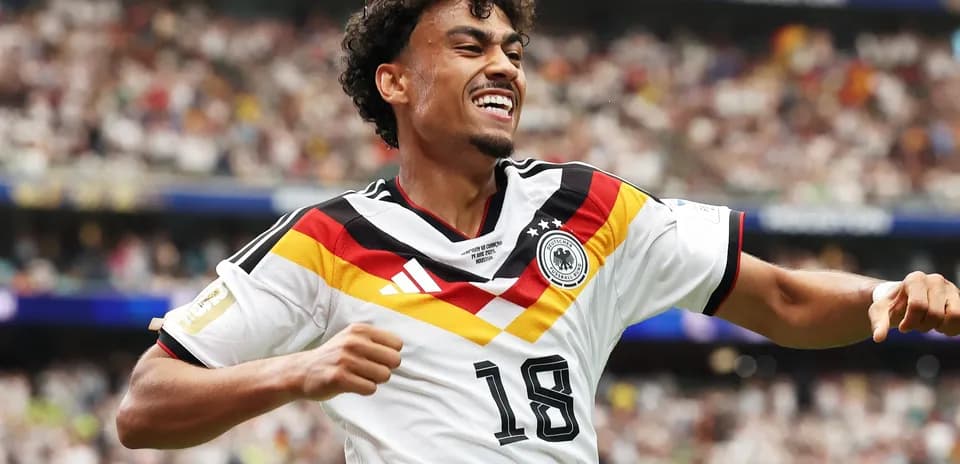Player celebrating goal for Germany in match