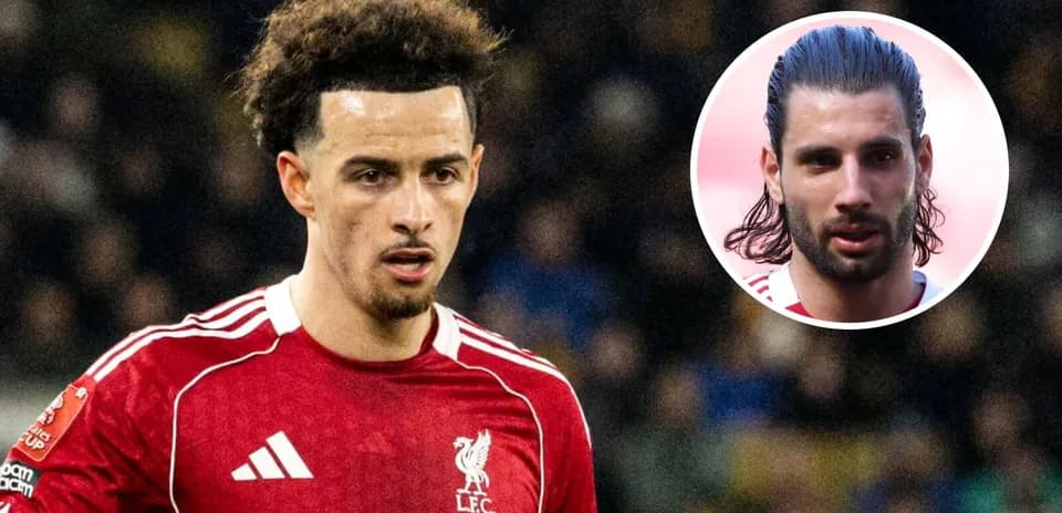 Liverpool player focused during match with blurred background