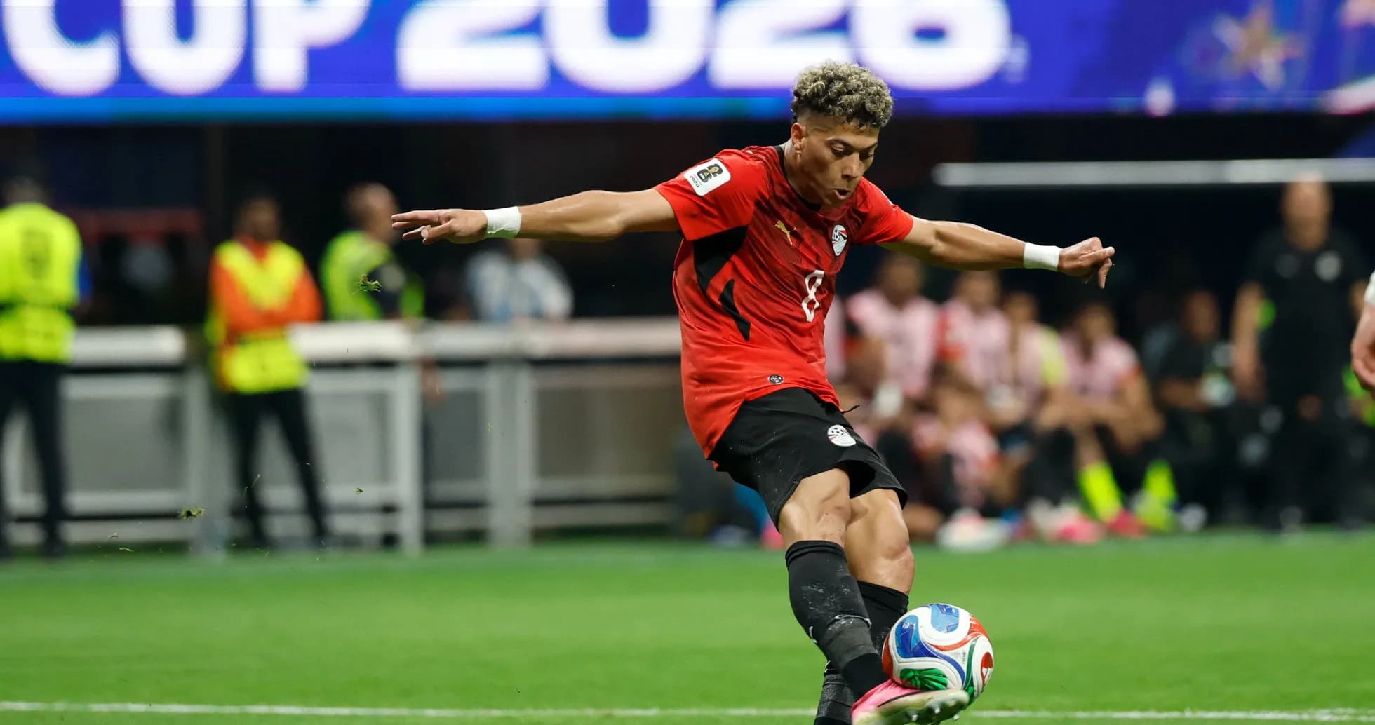 Player kicking the ball during match at Copa 2026