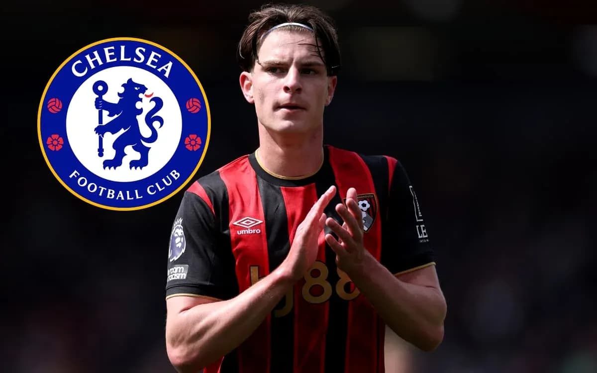 Player in Bournemouth kit with Chelsea logo background