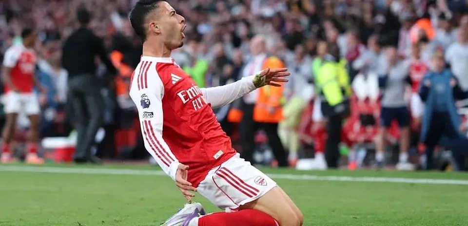 Arsenal player celebrating after scoring a goal