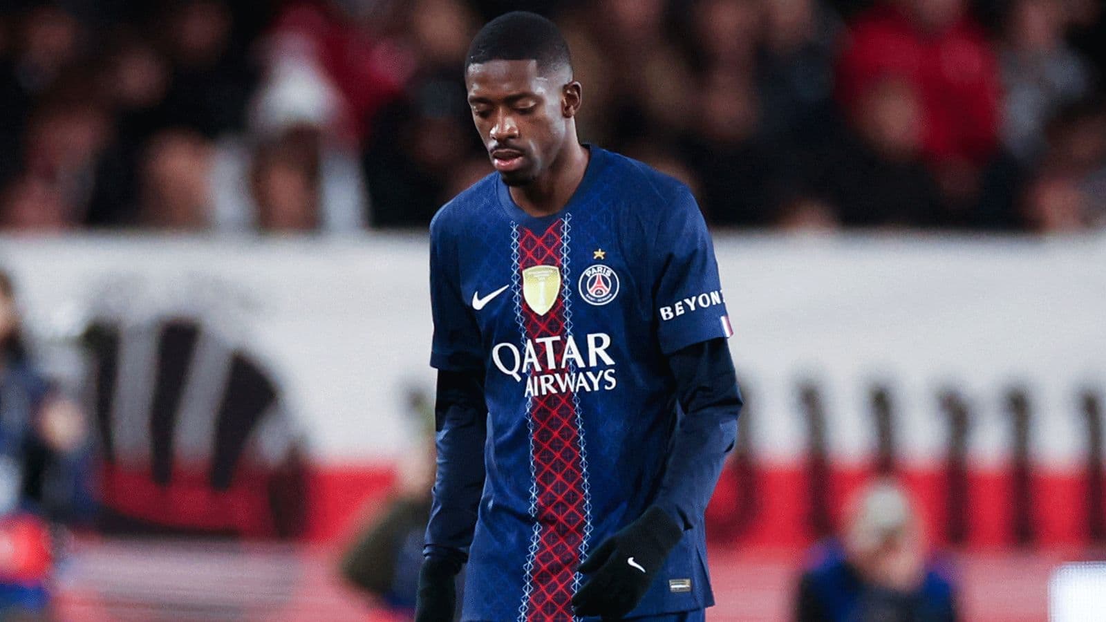 Player walking off the field in PSG jersey