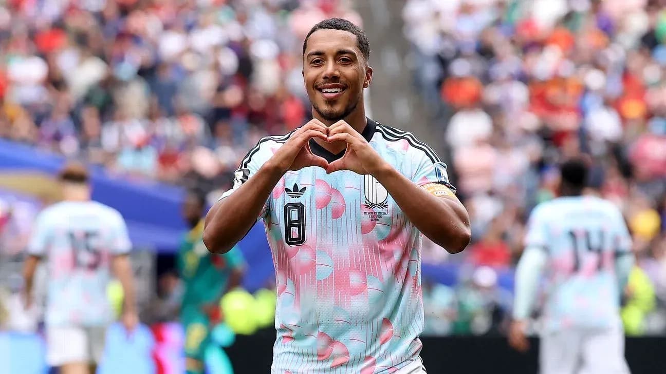Player celebrating with heart gesture during match