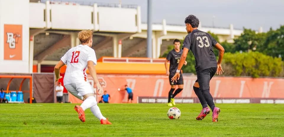 Player 12 in white chasing player 33 in black