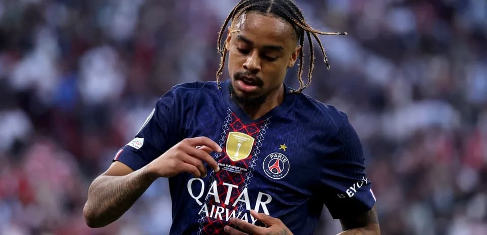 Player adjusting his jersey during match