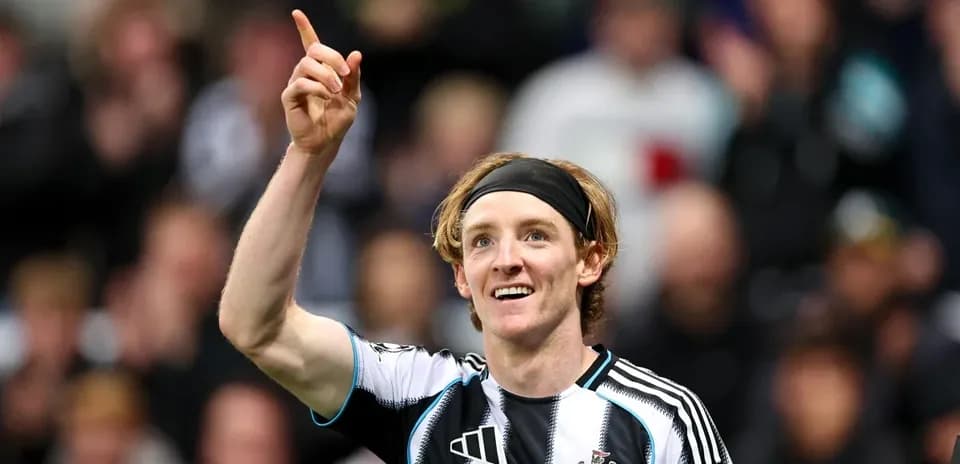 Player celebrating with raised finger after scoring