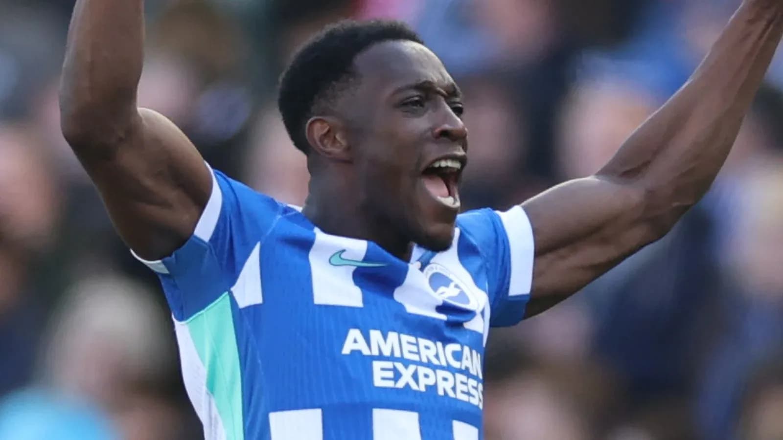 Player celebrating a goal on the pitch Player celebrating a goal on the pitch