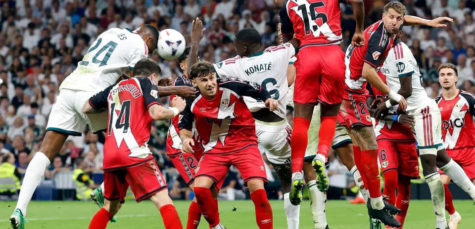 Players contesting a corner during Real Madrid match