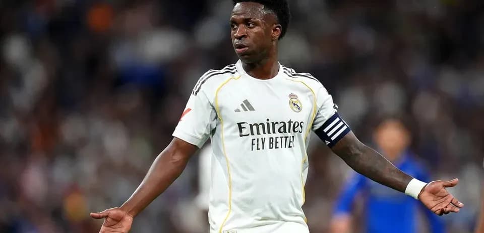 Player gesturing during match in Real Madrid kit