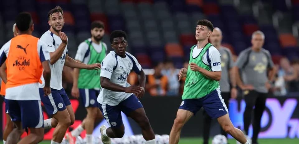 Players training and practicing passes on the field