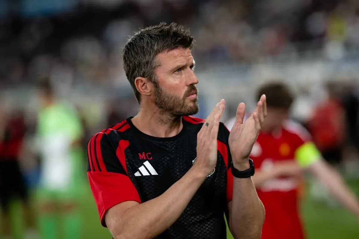 Coach applauding players after the match