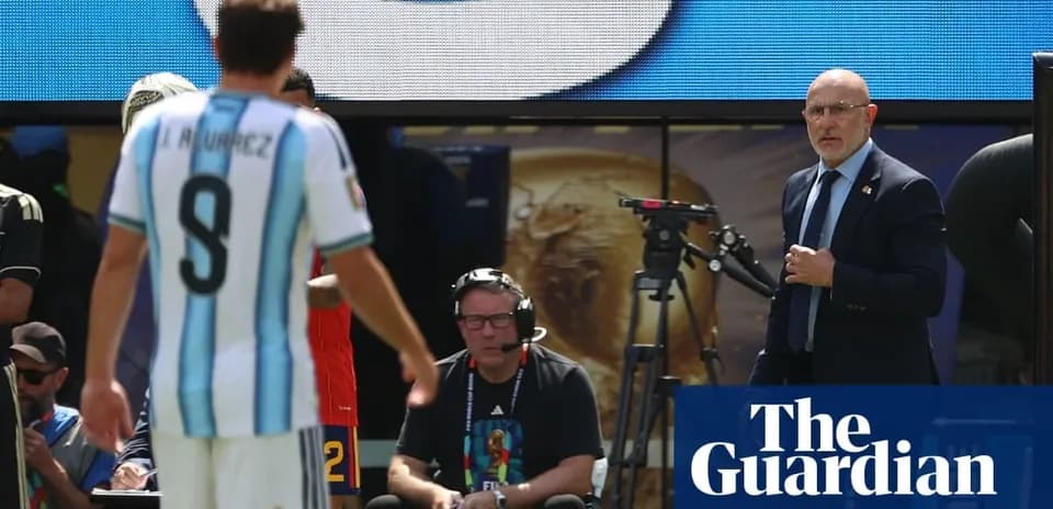 Argentinian player leaving field, coach observing closely