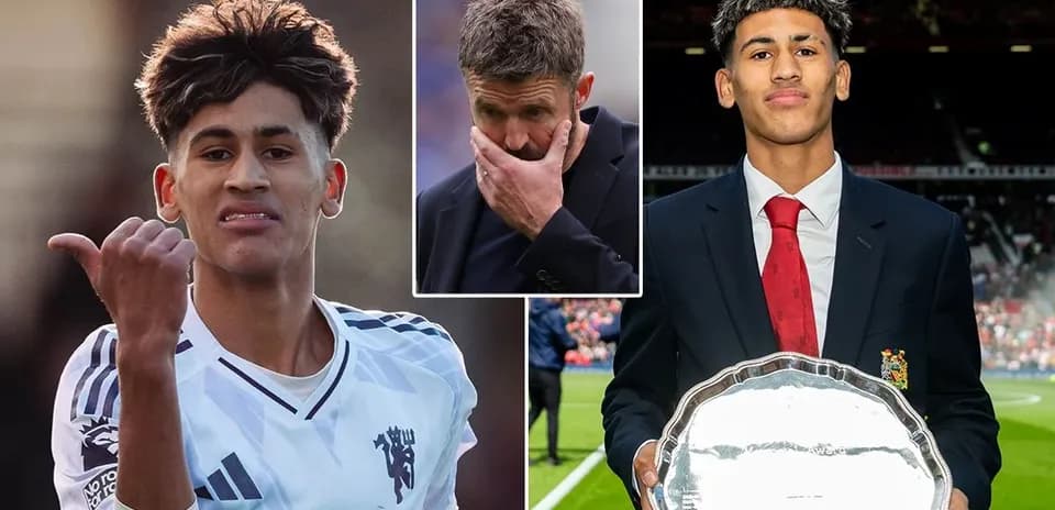 Young footballer celebrating with trophy, coach looking concerned