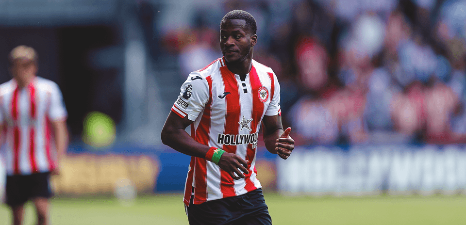 Player in Brentford kit during Premier League match