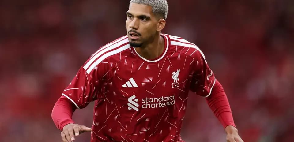 Player in Liverpool kit during match action