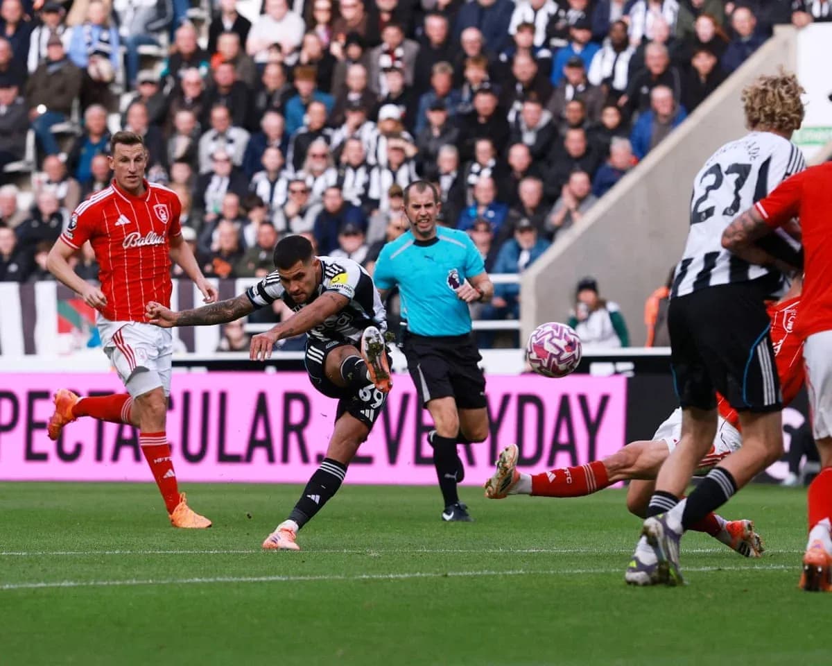 Newcastle player shooting during Nottingham Forest match