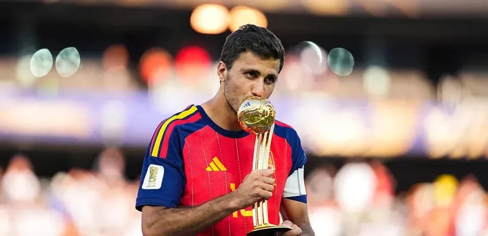 Player holding trophy after winning the tournament