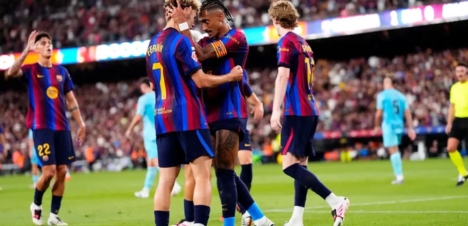 Barcelona players celebrating a goal during match