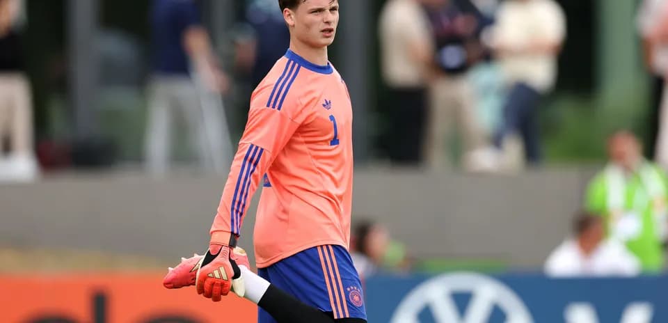 Goalkeeper stretching during warm-up before match