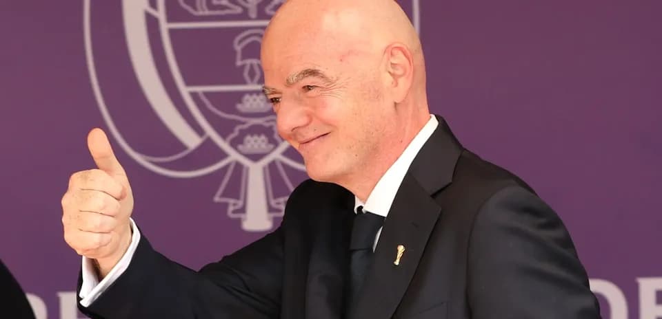 Man giving a thumbs up at an event
