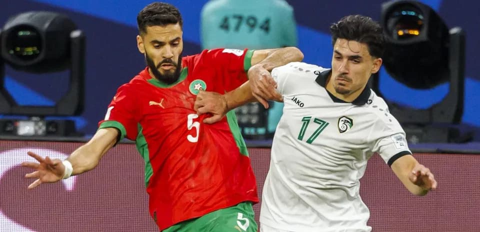 Moroccan player defending against opponent during match