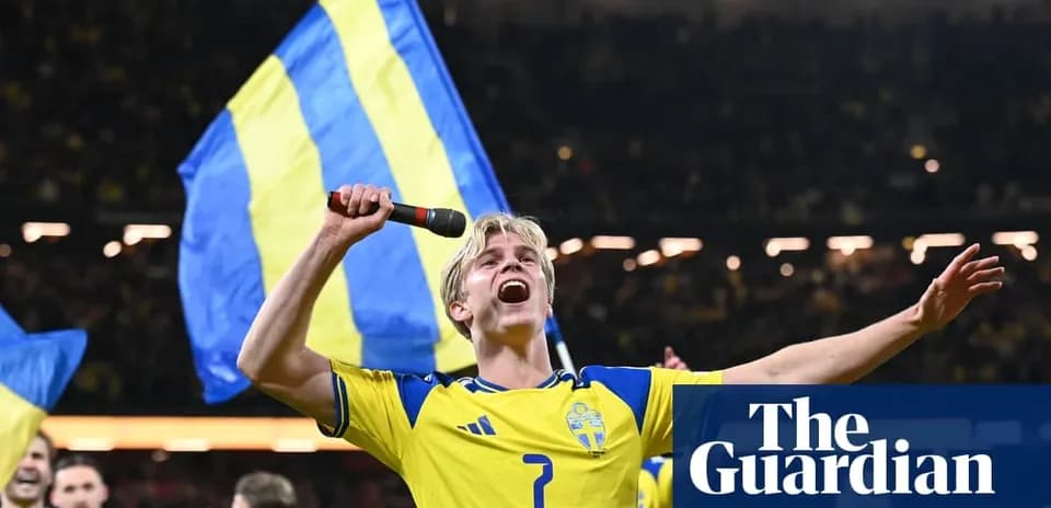 Player celebrating with microphone and flags after victory