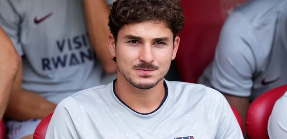 Player sitting on bench during a match