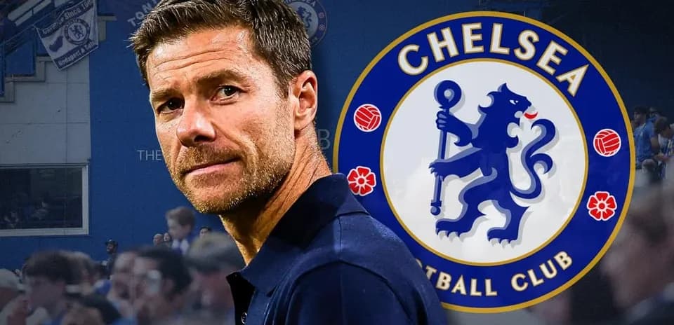 Coach with Chelsea FC logo in background
