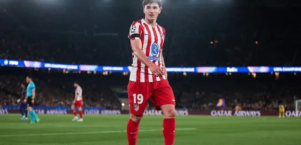 Atletico Madrid player on pitch during match