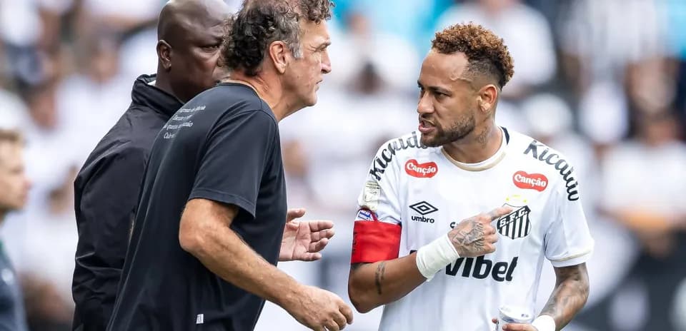 Neymar discussing with coach during match warm-up